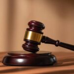 El Departamento de Justicia presenta denuncias contra Arizona, Nuevo México, Oregón y Washington impugnando leyes estatales que otorgan matrícula universitaria a precio de residente a inmigrantes indocumentados.